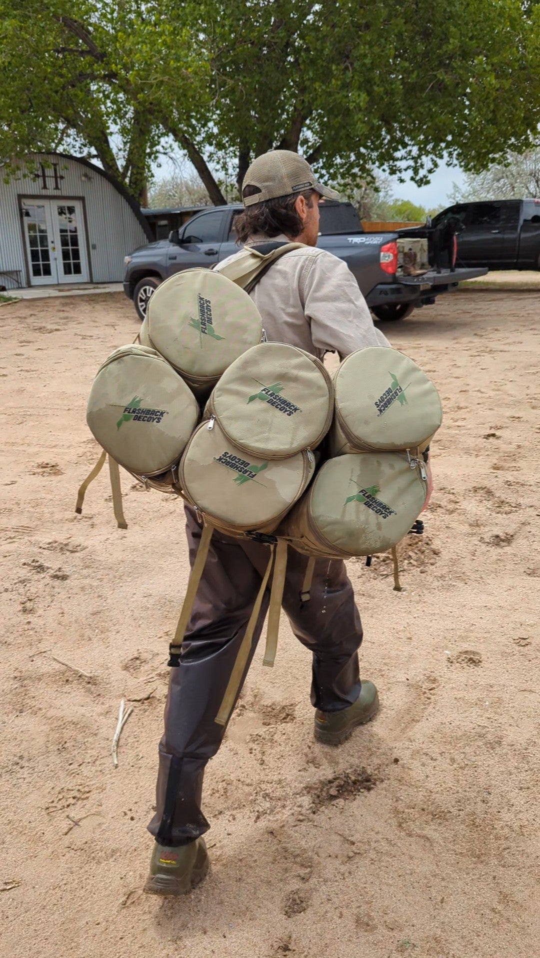 Hunter carrying six clipped-together Flashback decoy bags as a backpack